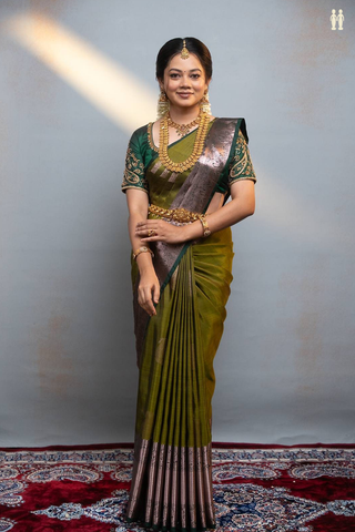 Kanchipuram Silk Saree In Mehendi Green With Paisley Motifs