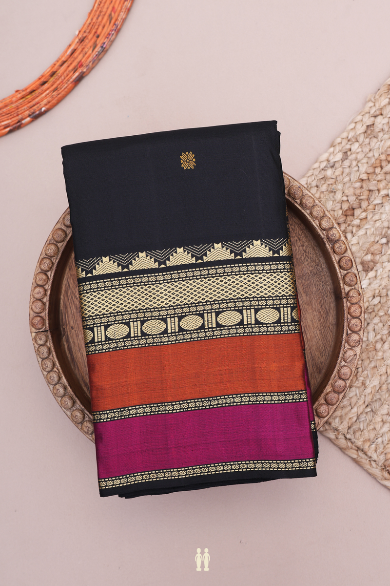 Kanchipuram Silk Saree In Black With Floral Peacock Buttas