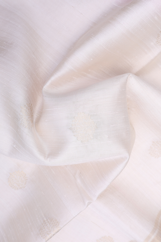 Raw Silk Saree In White With Zari Buttas