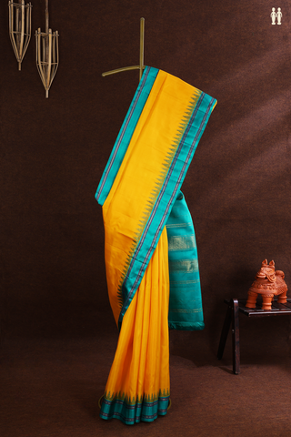 Kanchipuram Silk Saree In Saffron Yellow With Temple Border