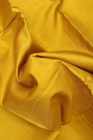 Kanchipuram Silk Saree In Sunflower Yellow With Zari Border