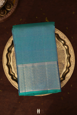 Kanchipuram Silk Saree In Teal Blue With Allover Design