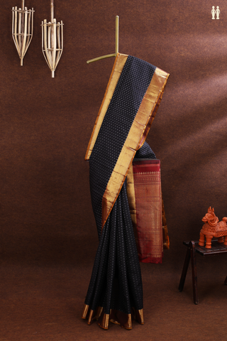 Kanchipuram Silk Saree In Black With Allover Zari Buttis