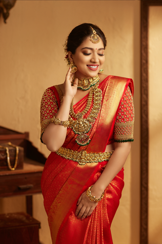 Our gorgeous client Veena in a chilli red vegan silk saree, Borderless with  gold motifs, and a striking contrast royal blue pallu and… | Instagram