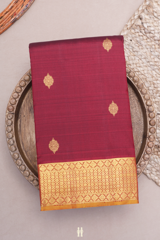 Kanchipuram Silk Saree In Maroon With Floral Zari Motifs