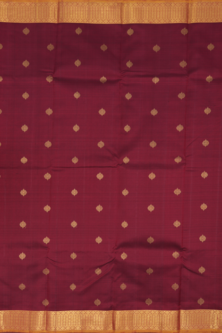 Kanchipuram Silk Saree In Maroon With Floral Zari Motifs