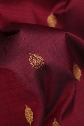 Kanchipuram Silk Saree In Maroon With Floral Zari Motifs