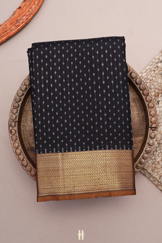 Kanchipuram Silk Saree In Black With Allover Zari Buttis