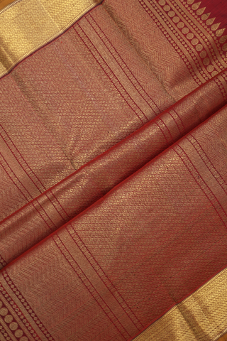 Kanchipuram Silk Saree In Black With Allover Zari Buttis