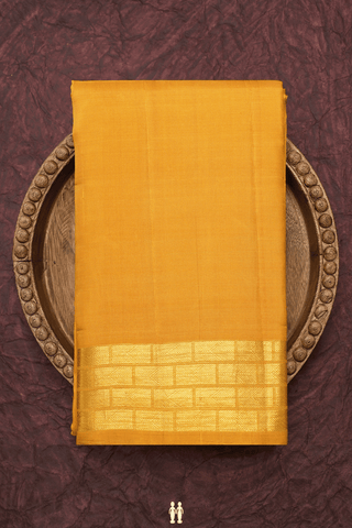 Arrow Zari Border Plain Saffron Yellow Kanchipuram Silk Saree
