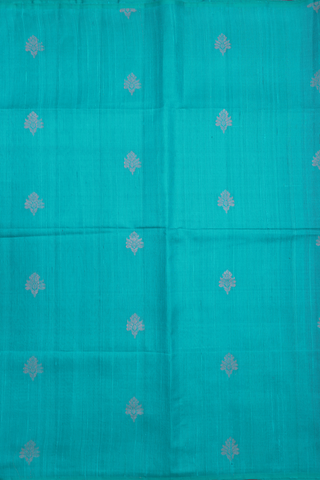 Raw Silk Saree In Peacock Blue With Zari Buttas