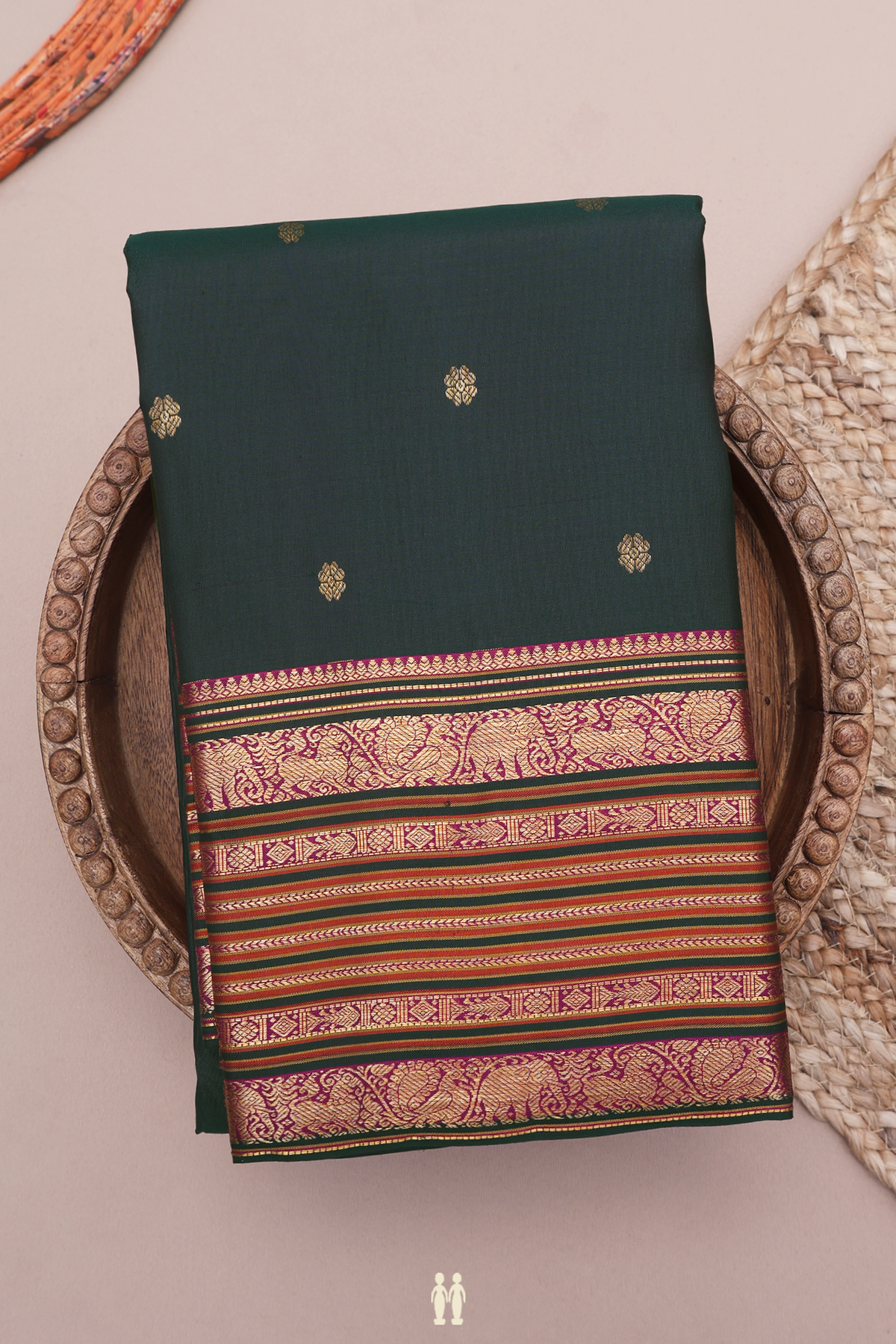 Kanchipuram Silk Saree In Bottle Green With Floral Buttis