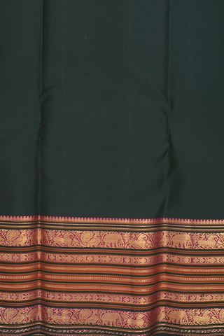 Kanchipuram Silk Saree In Bottle Green With Floral Buttis