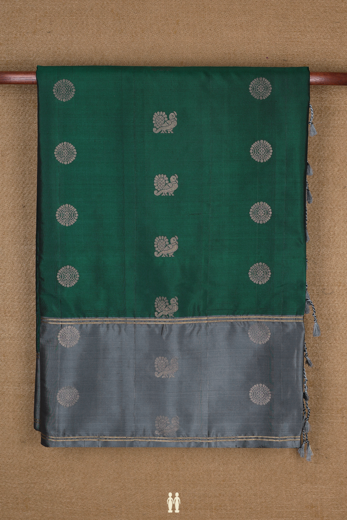 Soft Silk Saree In Dark Green With Peacock And Chakram Buttas