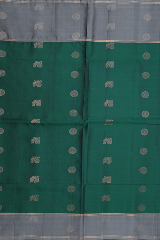 Soft Silk Saree In Dark Green With Peacock And Chakram Buttas