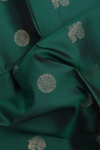 Soft Silk Saree In Dark Green With Peacock And Chakram Buttas