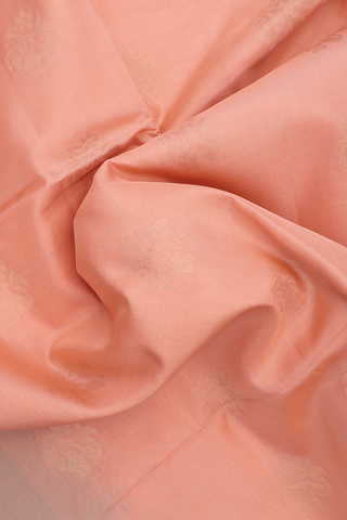 Soft Silk Saree In Pastel Orange With Floral Zari Motifs