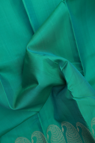 Kanchipuram Silk Saree In Peacock Green With Paisley Border