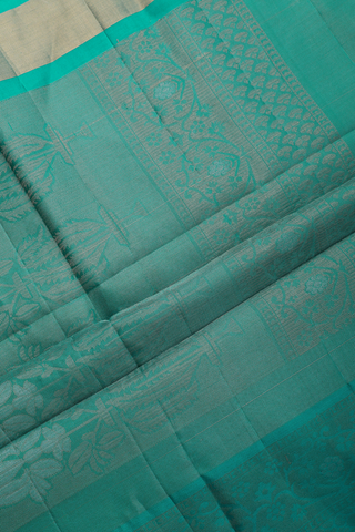 Soft Silk Saree In Green With Zari Buttas