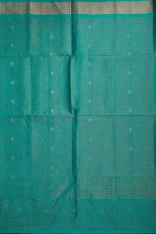 Soft Silk Saree In Green With Zari Buttas