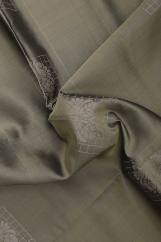 Soft Silk Saree In Green With Zari Motifs