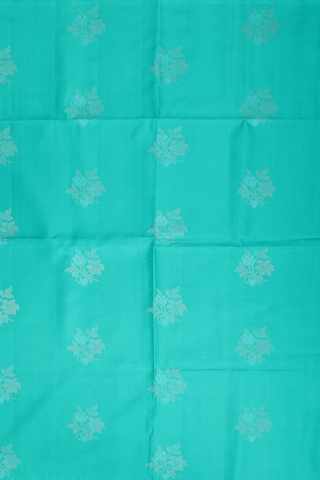 Soft Silk Saree In Teal Green With Floral Motifs