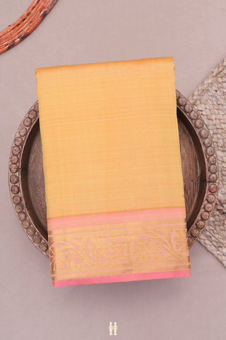 Kanchipuram Silk Saree In Light Orange With Floral Border