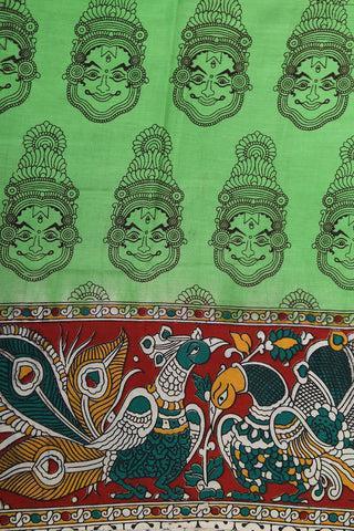 Traditional Border With Kathakali Design Green Kalamkari Printed Silk Saree