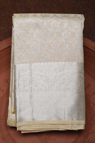 Silver Zari Yazhi Border In Brocade Cream Color Kanchipuram Silk Saree