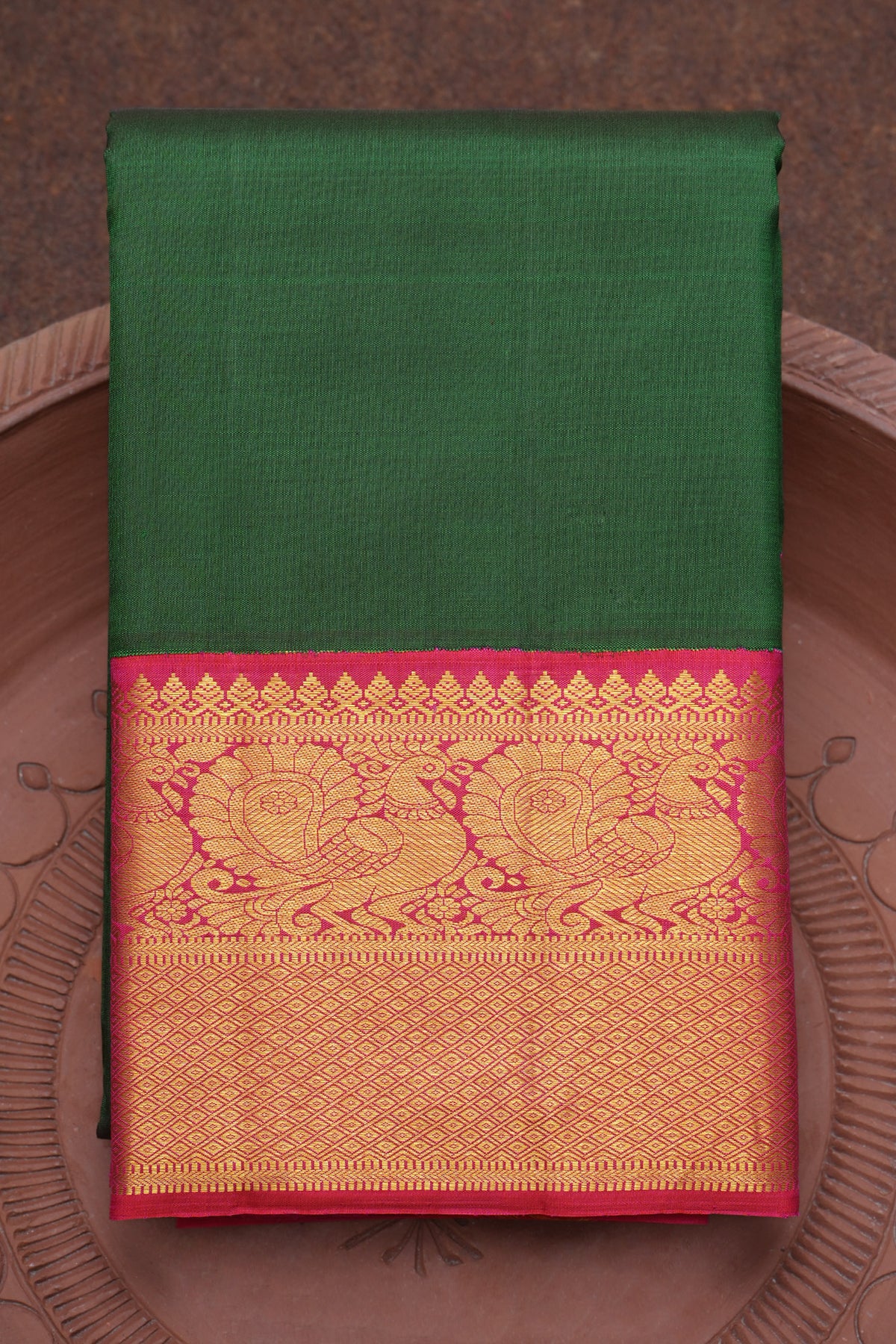 Peacock And Diamond Zari Border Plain Bottle Green Kanchipuram Silk Saree