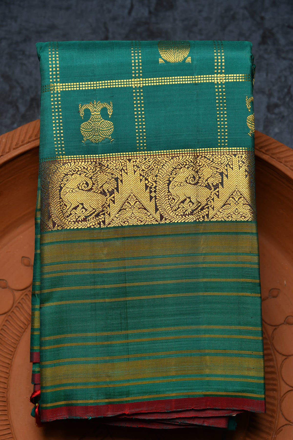 Traditional Border With Checks And Iruthalai Pakshi Rudraksh Butta Pine Green Kanchipuram Silk Saree