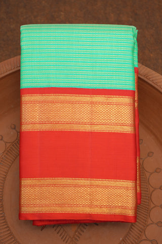 Contrast Rettai Pettu Korvai Border With Zari Stripes Mint Green Kanchipuram Silk Saree