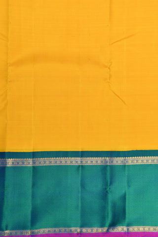 Contrast Rettai Pettu Border In Plain Deep Yellow Kanchipuram Silk Saree