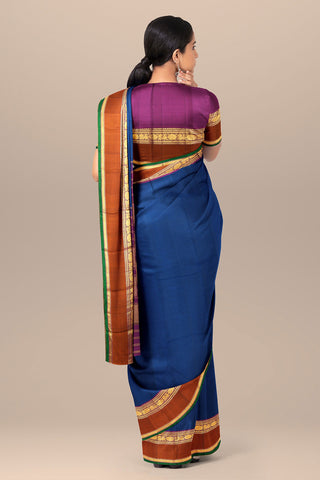 Rettai Pettu Border In Plain Peacock Blue Kanchipuram Silk Saree