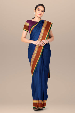 Rettai Pettu Border In Plain Peacock Blue Kanchipuram Silk Saree