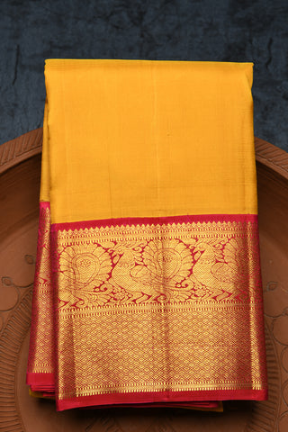 Contrast Big Border In Plain Mango Yellow Kanchipuram Silk Saree