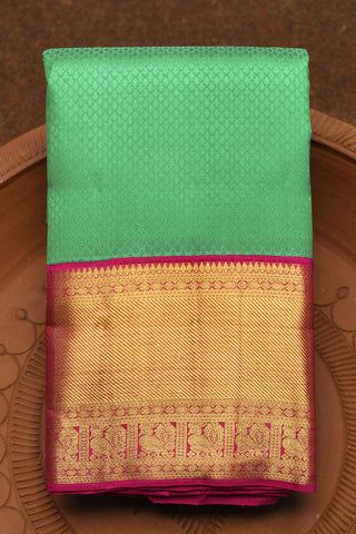 Contrast Korvai Peacock Border In Jacquard Mint Green Kanchipuram Silk Saree