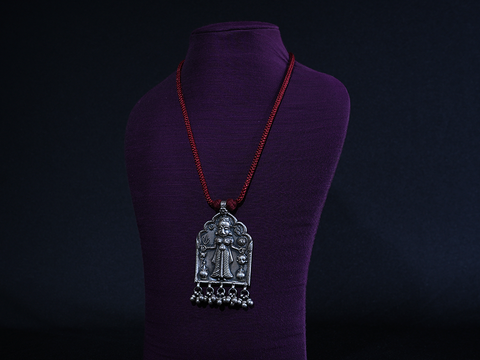 Tribal Embossed Silver Pendant Maroon Thread Necklace