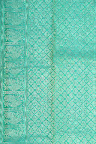 Silver Zari Border In Plain Pear Green Kanchipuram Silk Saree