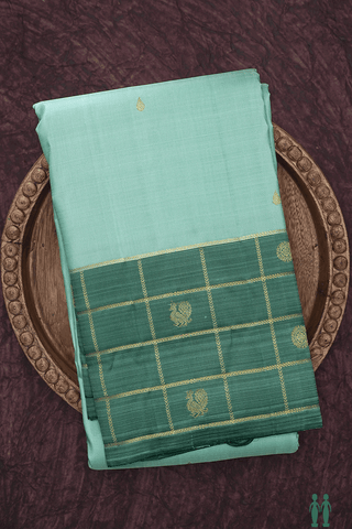 Thilagam Zari Buttis Mint Green Kanchipuram Silk Saree