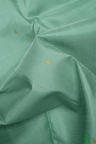 Thilagam Zari Buttis Mint Green Kanchipuram Silk Saree