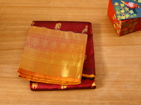 Traditional Animal Motifs In Rich Maroon Kanchipuram Silk Pavadai Sattai
Material