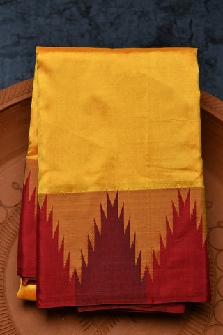 Temple Border In Plain Yellow Kanchipuram Silk Saree